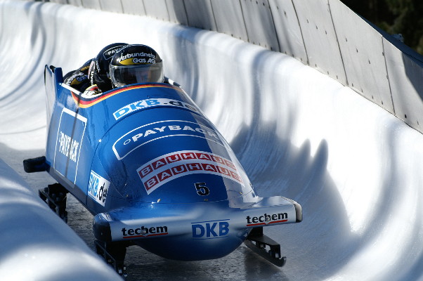 Bobsleigh sliding dow an ice pipe